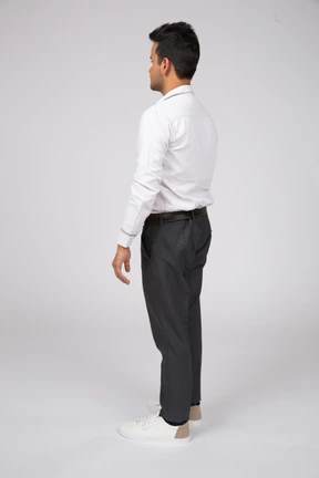 Man in white shirt standing