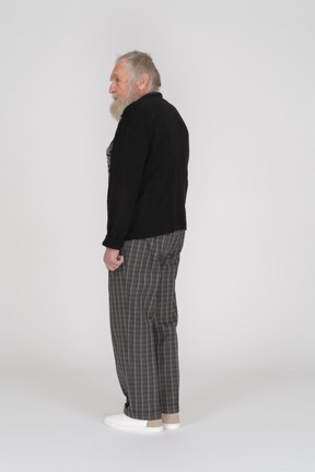 Side view of an old man standing