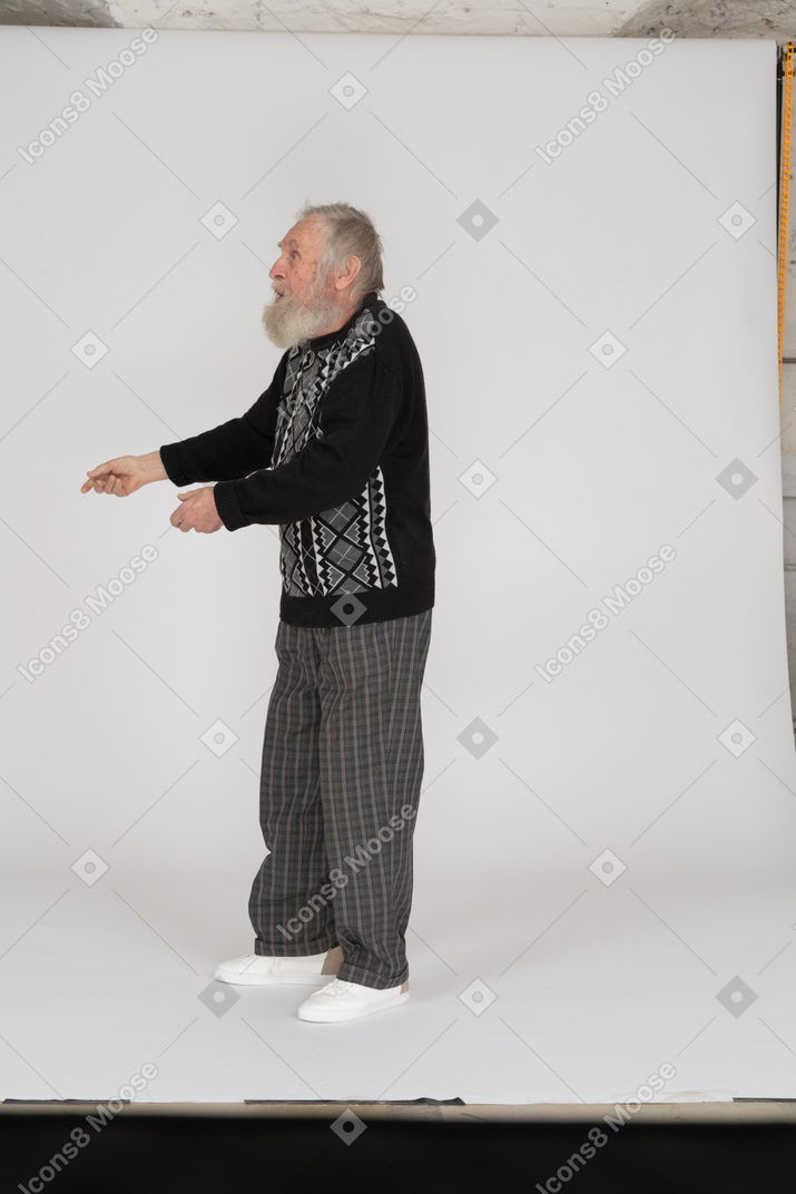 Old man outstretching arms