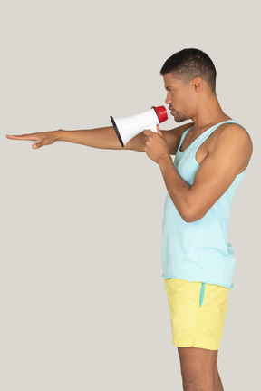Man holding megaphone and pointing forward