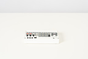 White fm synthesizer on a white background