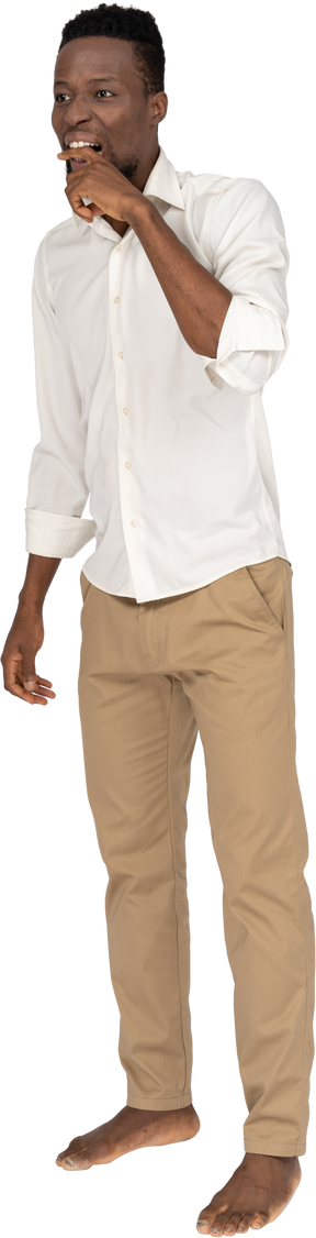 Man in white shirt standing