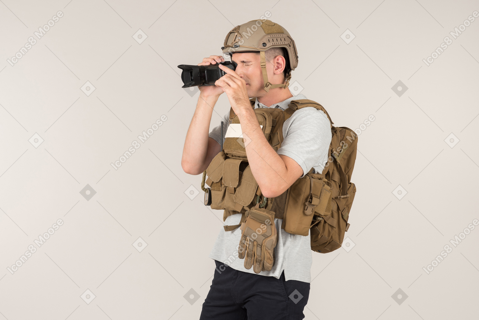 Male hot zone reporter using camera