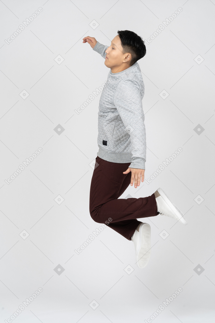 Man in casual clothes jumping