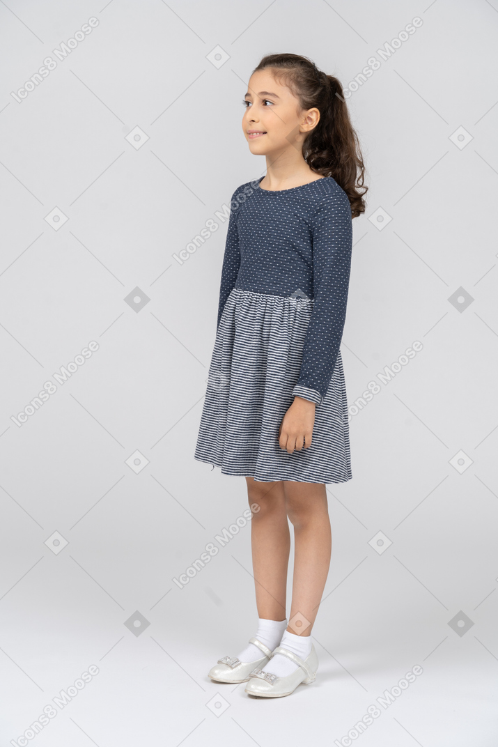Full length of a smiling girl in casual clothes