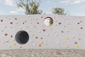 Climbing wall with sandy floor