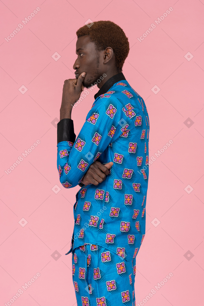Black man in blue pajamas