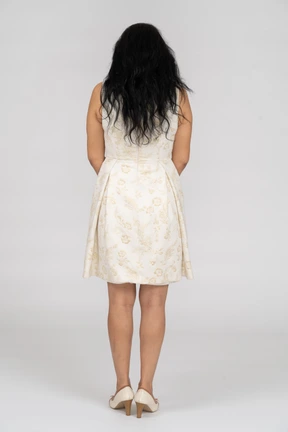 Woman in a white dress standing