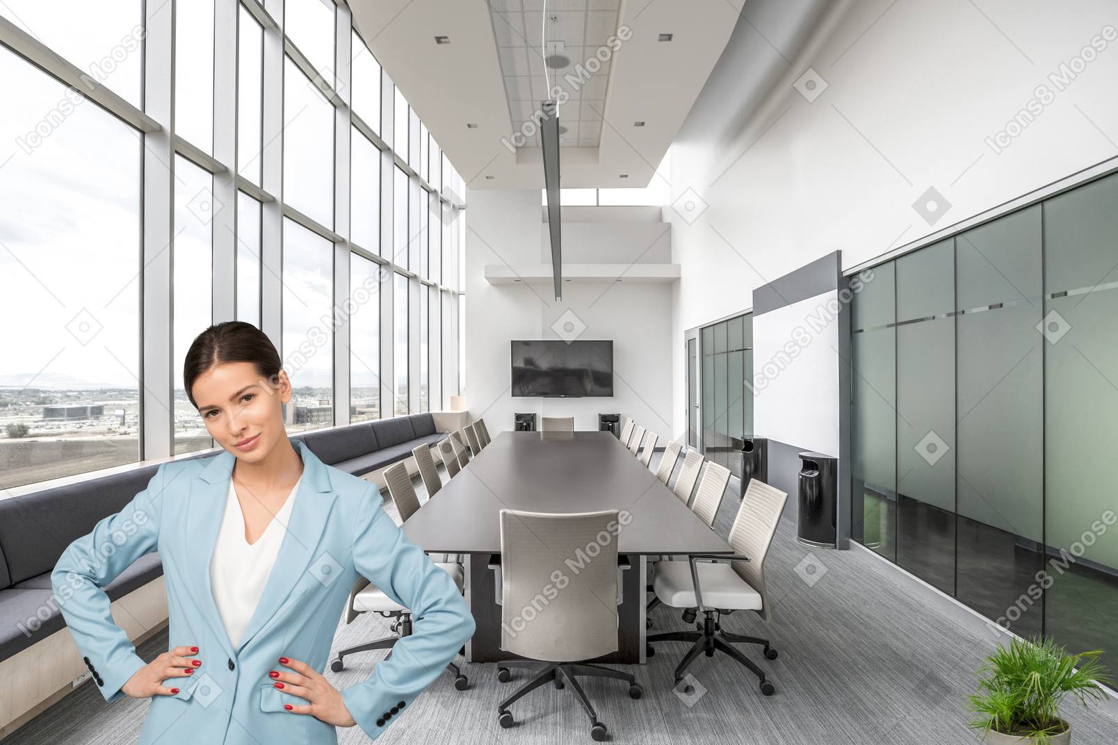 A woman standing in front of a conference room
