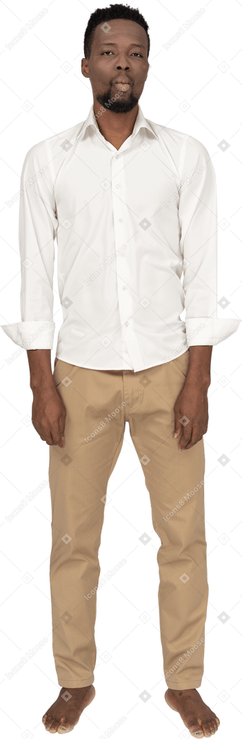 Man in white shirt standing