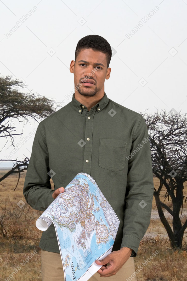 Person with a map of the world