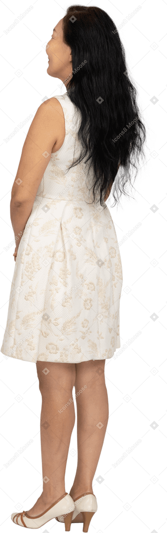 Woman in beautiful dress standing