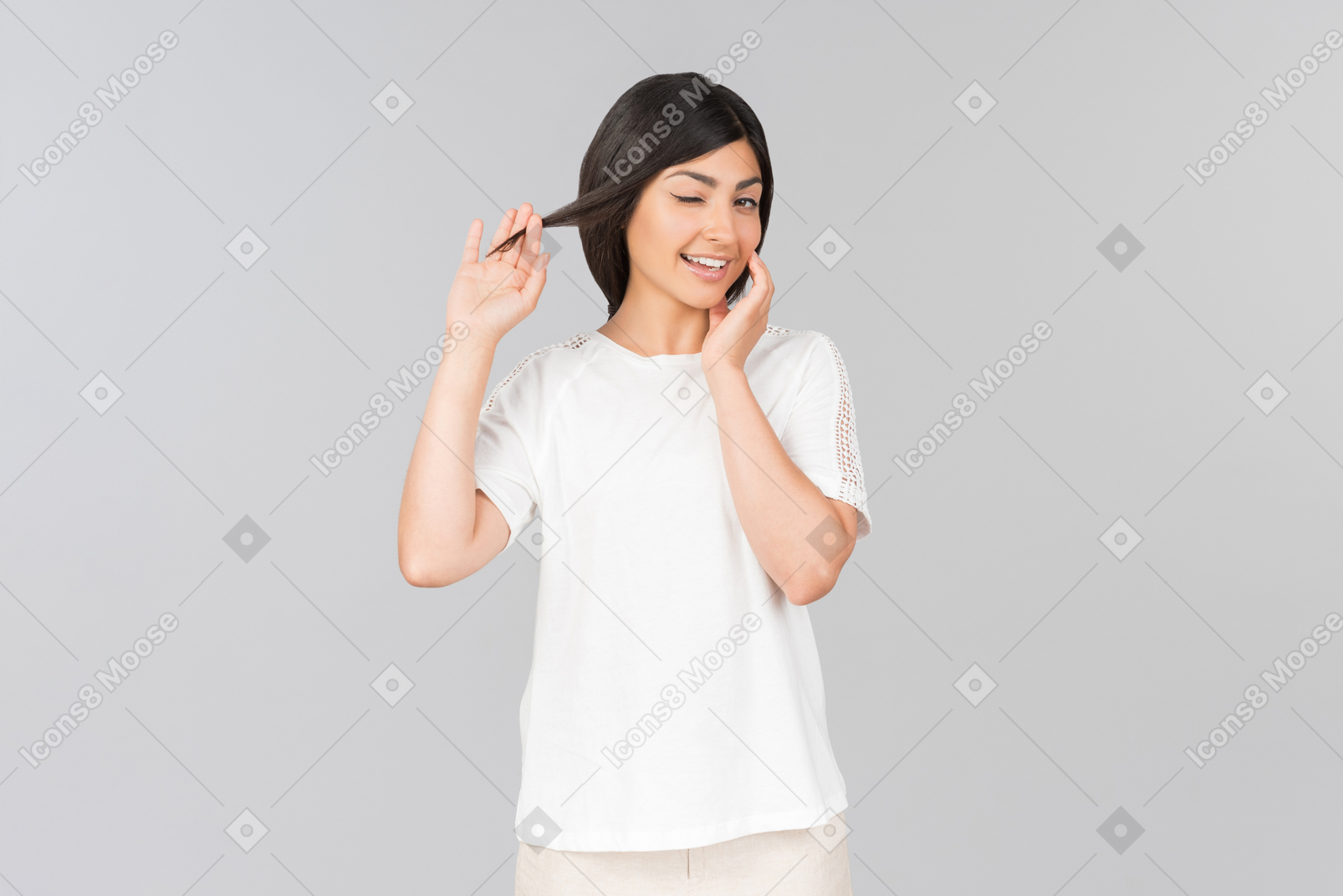 Young indian woman in comfy clothes winking