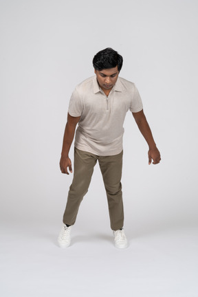 Man in casual clothes posing