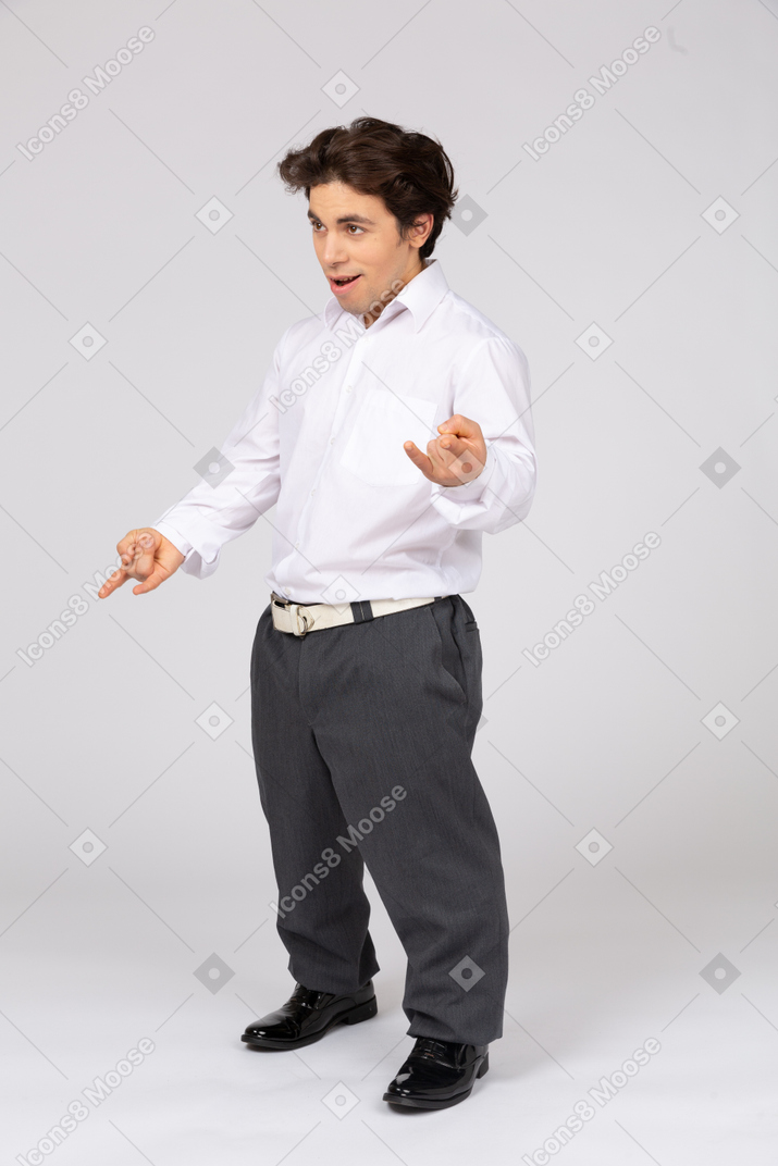 Excited office worker showing rock sign