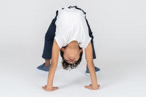 A boy doing bridge exercise