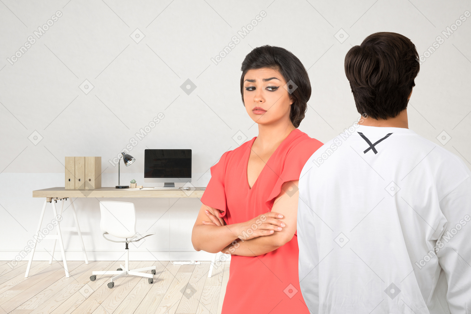 A man standing next to a woman in an office