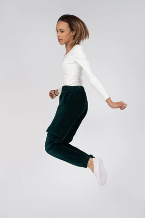 Woman in casual clothes jumping