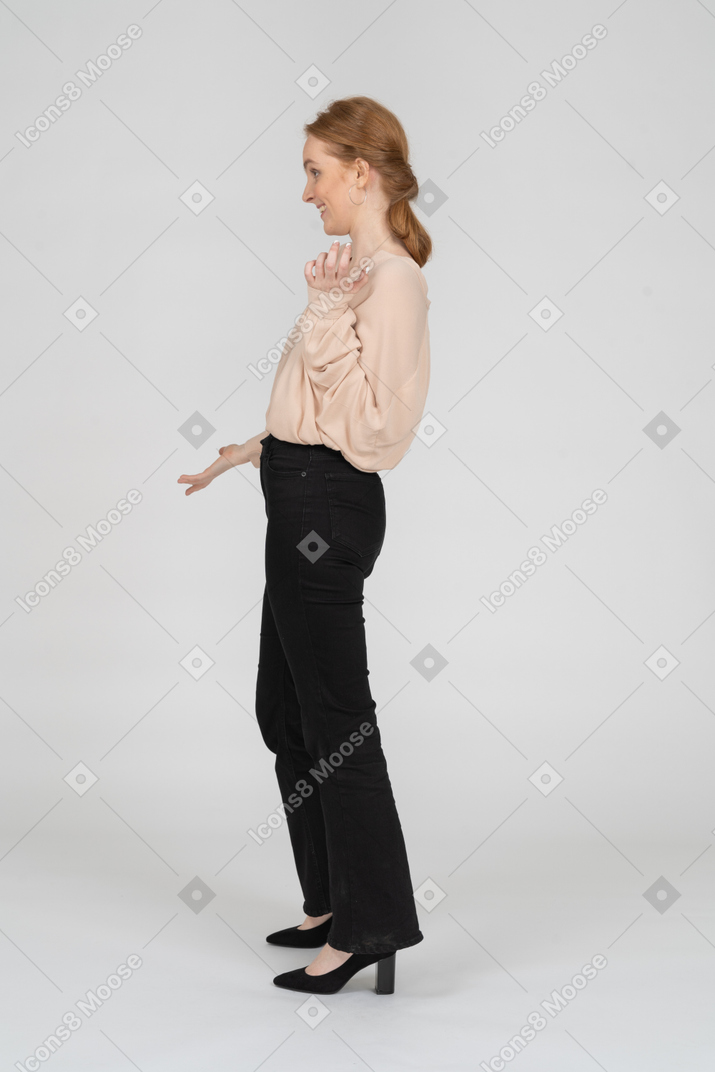 Woman in beautiful blouse standing