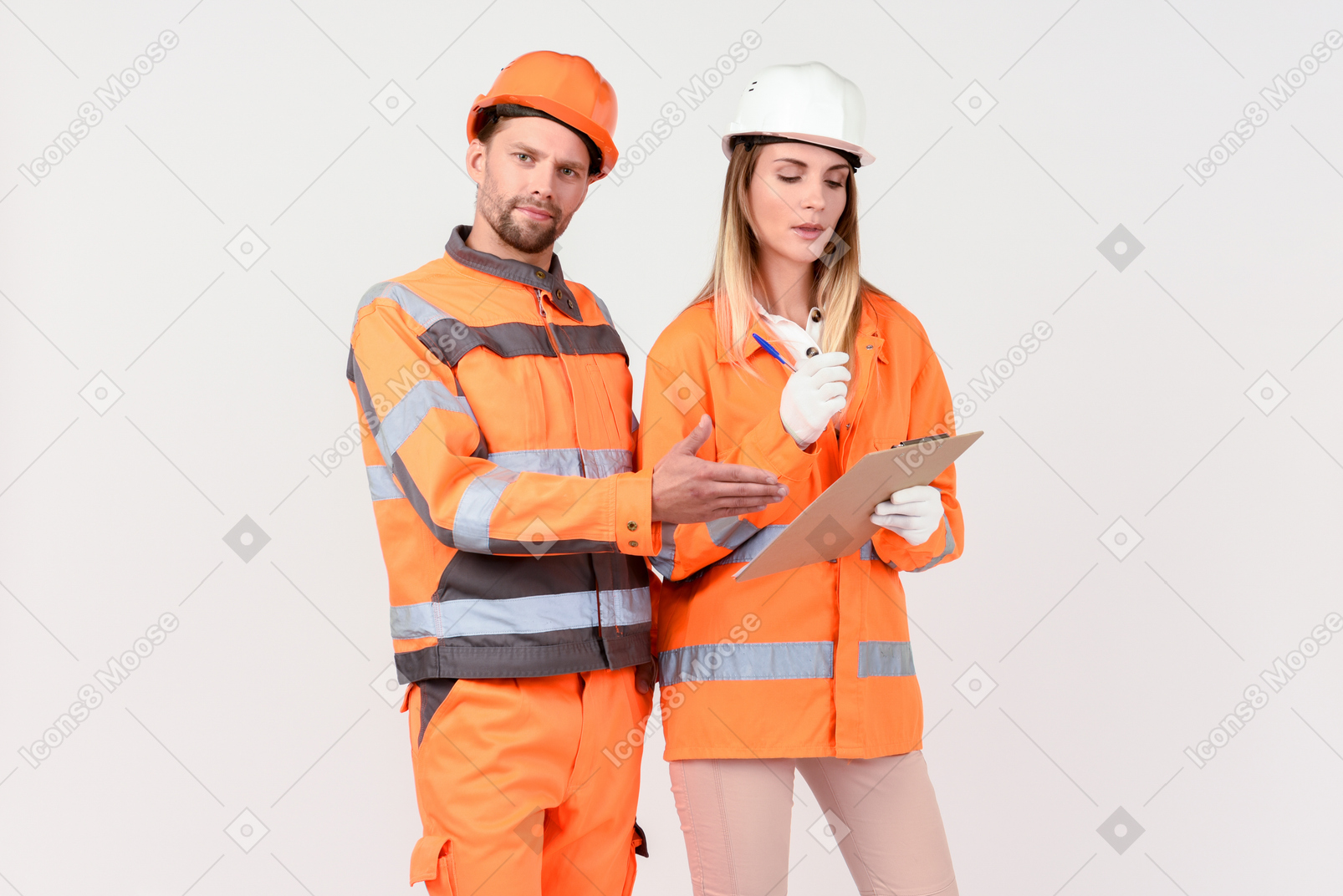 Female and male workers looking at something in the file