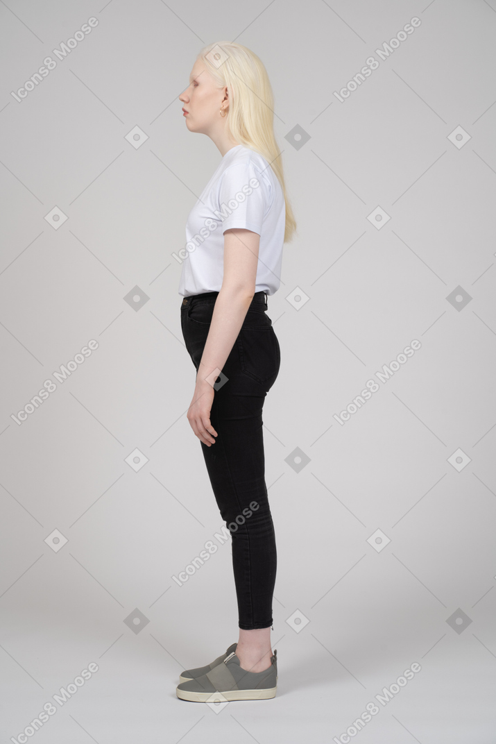 Side view of a teenage girl in casual clothes